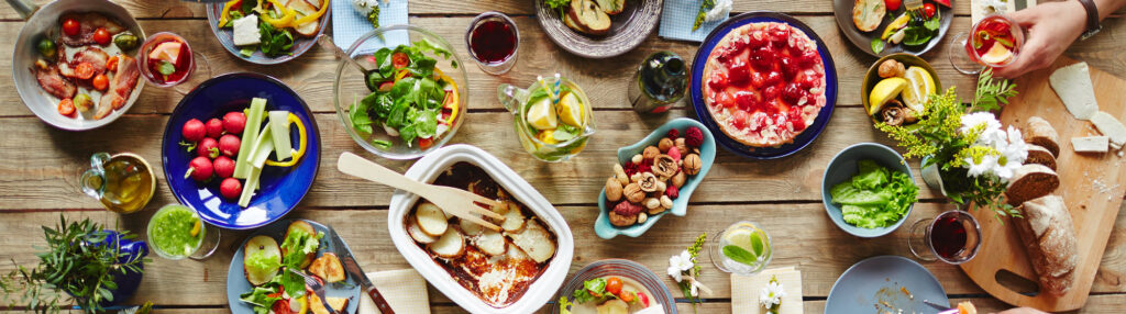 the dinner table with lotsa food